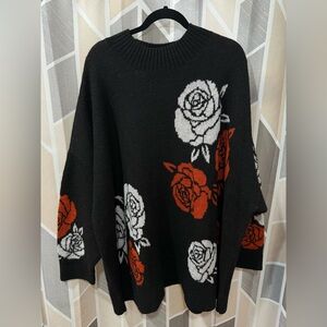 Torrid Black Sweater with Red and White Floral Design